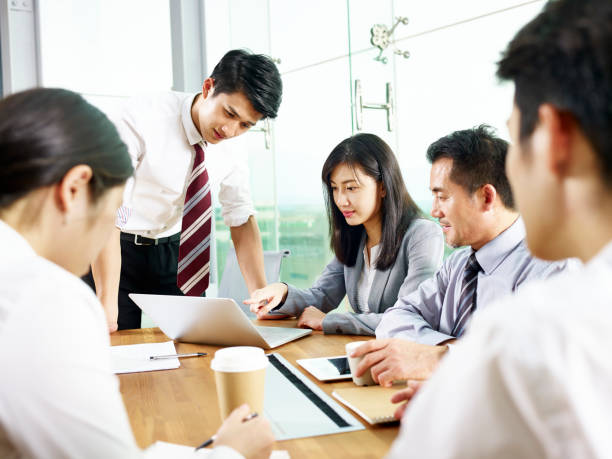 istock young asian business man presenting ideas during meeting 1089367888