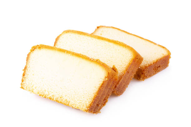 istock Sliced moist butter cake isolated on white background. 1089369786