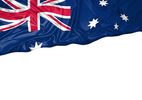 National flag of Australia hoisted outdoors with white background. Australia Day Celebration. Front view