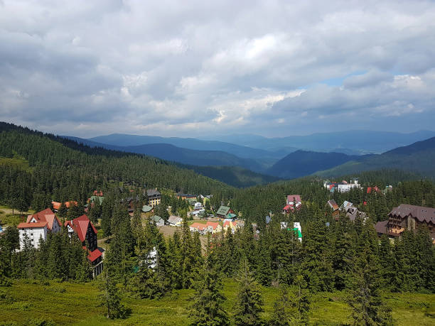 istock Mountain village landscape with dramatic sky 1089376330