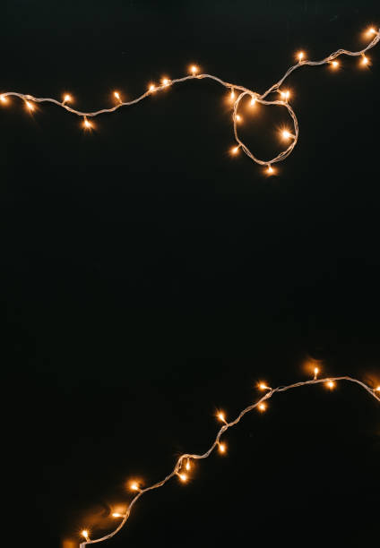 Christmas lights decoration on dark background.