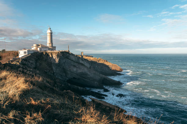 маяк в сантандере, испания - santander стоковые фото и изображения