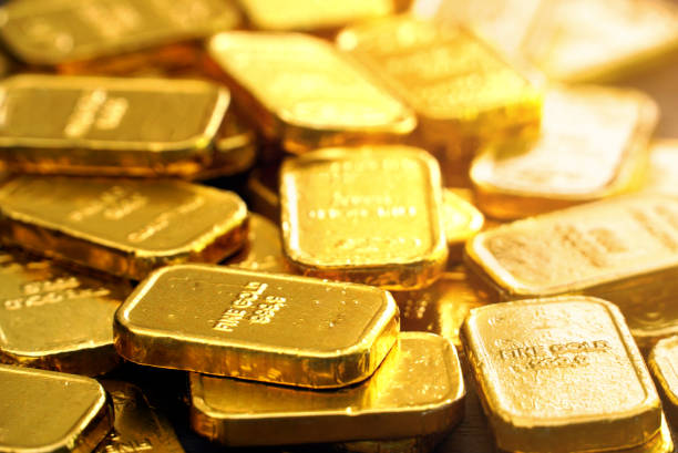 istock Group of golds bar background 1089382006
