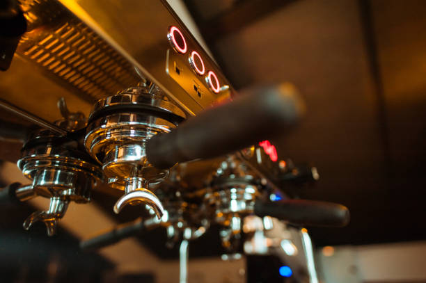 istock espresso shot from coffee machin in coffee shop 1089382686