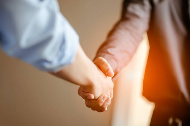 istock Business people shaking hands.business and office concept . 1089382714