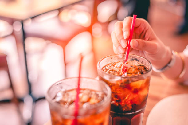 istock Two glass soft drink with ice in restaurant background 1089383794