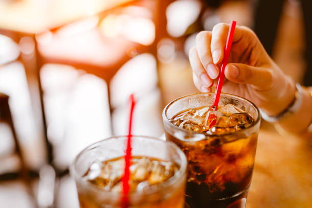 istock Two glass soft drink with ice in restaurant background. 1089383884