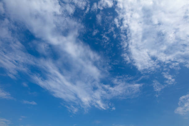 istock Background of blue sky with clouds, full frame 1089394392