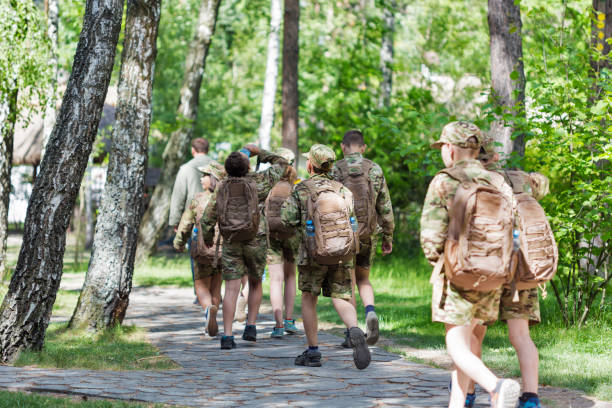 Squad of teenagers, members of Plast youth National Scouting Organization. stock photo
