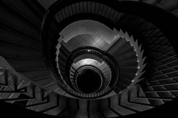 istock Spiral staircase in an old building,lack and white, monochromatic 1089395426