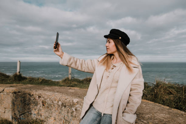 istock Young woman taking her selfie picture 1089402496