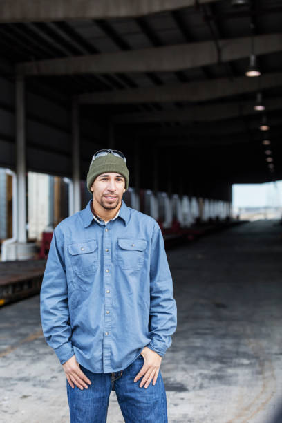 istock Manual worker standing outdoors at shipping port 1089408966