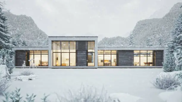 Photo of Modern Mountain House In Snowy Weather