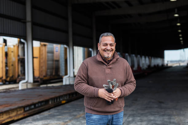istock Manual worker standing outdoors at shipping port 1089410782