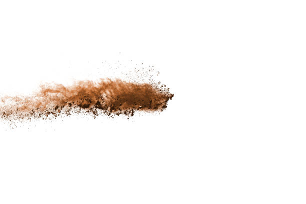 istock Brown color powder explosion on white background. Colored cloud. Colorful dust explode. Paint Holi. 1089413640