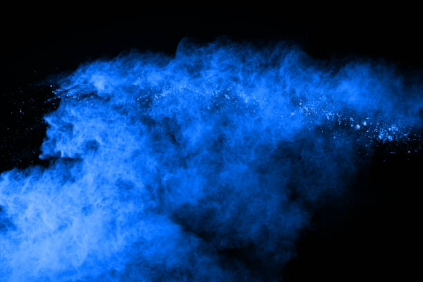 istock Blue powder explosion on black background. Colored cloud. Colorful dust explode. Paint Holi. 1089414058