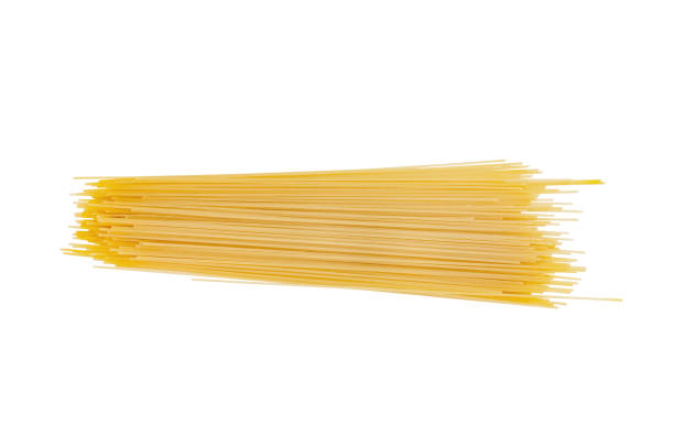 istock One heap of raw long spaghetti isolated on white background. Top view 1089414486