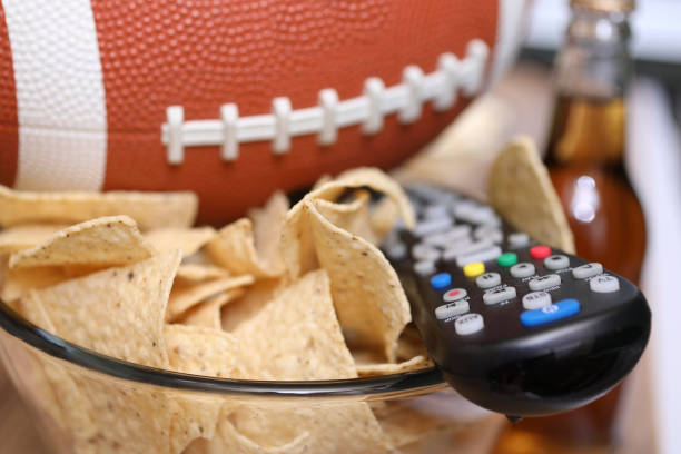 istock Watching the football game with snacks. 1089414550