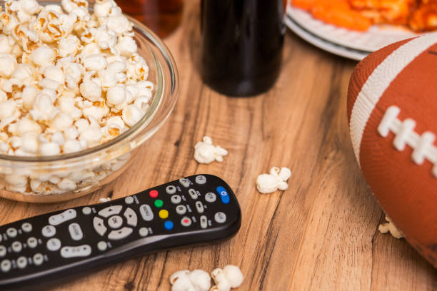 istock Watching the football game with snacks, drinks. 1089414614