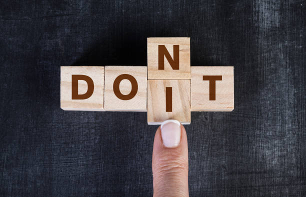 istock Finger pushing cubes, changing the word 