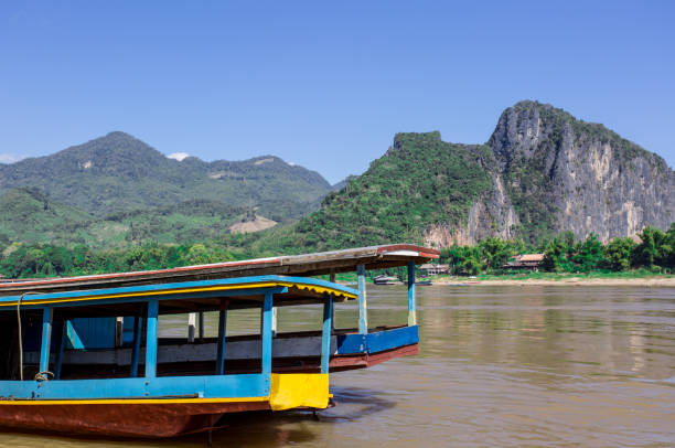 wooden boats near pak ou caves, mekong, luang prabang - luang phabang laos thailand mekong river imagens e fotografias de stock