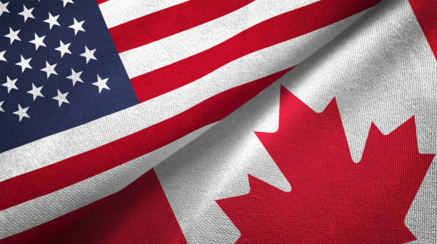 canadá y estados unidos dos banderas juntos relaciones textil tela textura de la tela - canada fotografías e imágenes de stock
