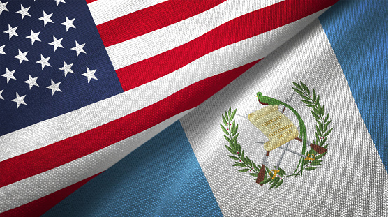 Guatemala and United States flags together realtions textile cloth fabric texture