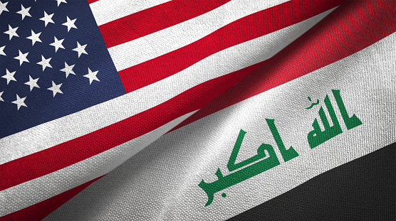 Irak y Estados Unidos dos banderas juntos relaciones textil tela textura de la tela photo
