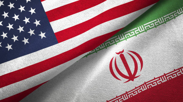 Iran and United States two flags together realations textile cloth fabric texture Iran and United States flags together realtions textile cloth fabric texture iranian culture stock pictures, royalty-free photos & images
