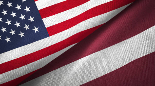 istock Latvia and United States two flags together realations textile cloth fabric texture 1089424788