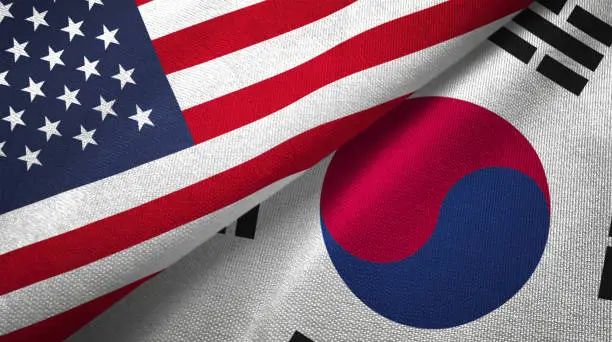 South Korea and United States flags together realtions textile cloth fabric texture