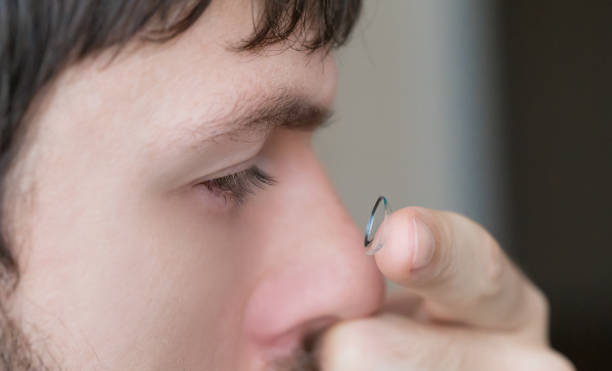 istock Contact lens and man eye, close up 1089425088