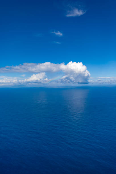 istock seascape with rainbow and cloudscape, indian ocean 1089425180