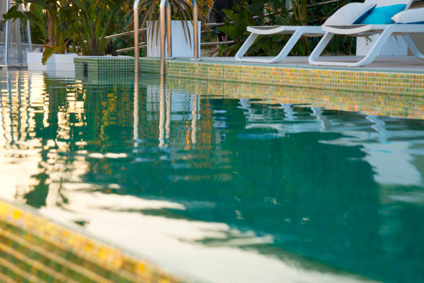 istock Modern swimming pool with deck chair 1089425186