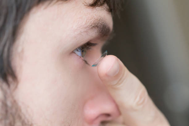 istock Contact lens and man eye, close up 1089425194
