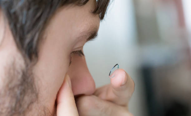 istock Contact lens and man eye, close up 1089425244
