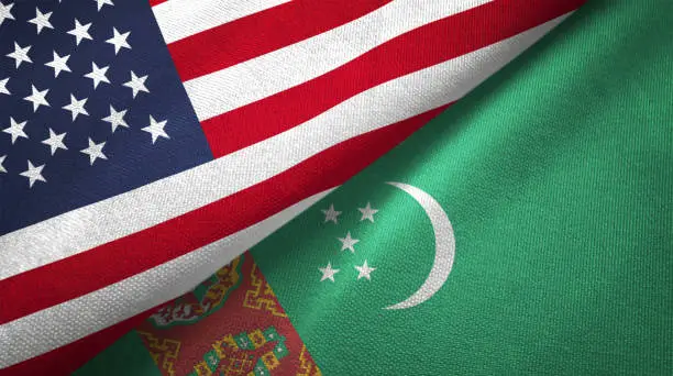 Photo of Turkmenistan and United States two flags together realations textile cloth fabric texture