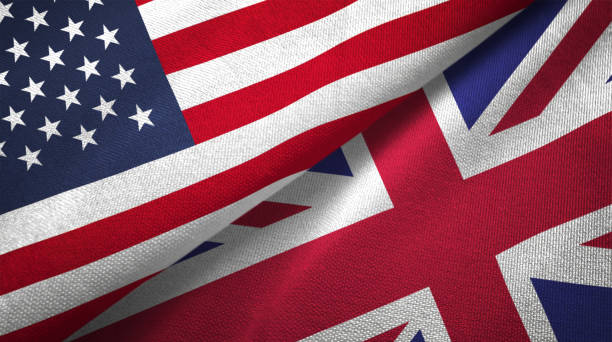великобритания и соединенные штаты два флага вместе realations текстильной ткани ткани текстуры - british flag стоковые фото и изображения