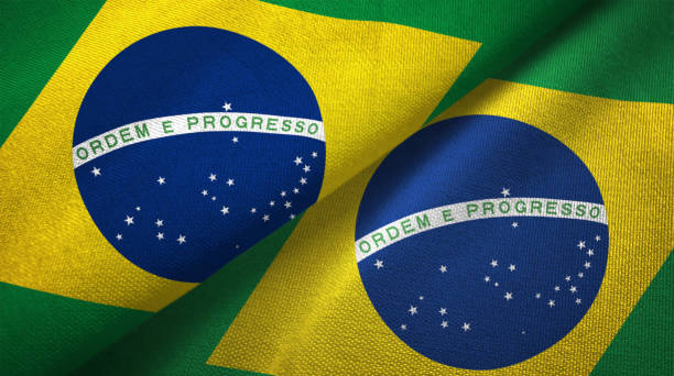 istock Brazil two flags together realations textile cloth fabric texture 1089427666