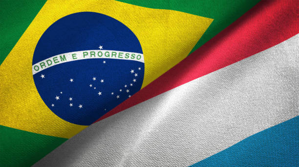 istock Luxembourg and Brazil two flags together realations textile cloth fabric texture 1089428372
