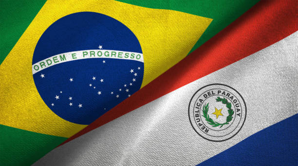 Paraguay and Brazil two flags together realations textile cloth fabric texture Paraguay and Brazil flags together realtions textile cloth fabric texture paraguay stock pictures, royalty-free photos & images