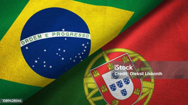 Portugal And Brazil Two Flags Together Realations Textile Cloth Fabric Texture Stock Photo - Download Image Now