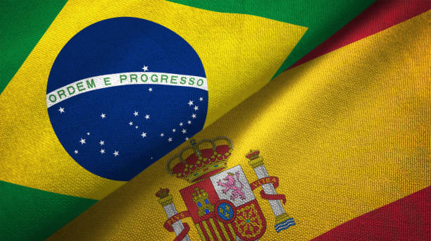 istock Spain and Brazil two flags together realations textile cloth fabric texture 1089429598