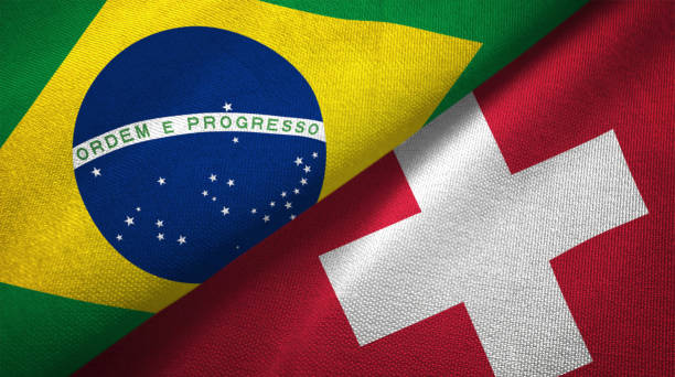 Switzerland and Brazil two flags together realations textile cloth fabric texture Switzerland and Brazil flags together realtions textile cloth fabric texture swiss flag photos stock pictures, royalty-free photos & images