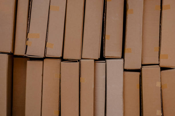 istock Cardboard boxes are aligned forming a pattern nearly symmetric 1089430386
