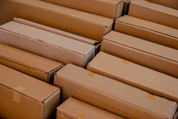 istock Cardboard boxes are aligned forming a pattern nearly symmetric 1089430600
