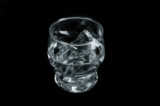 istock Chilled Water with Ice Cubes on Black Background 1089432284