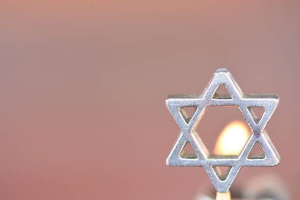 istock Star of David on a candle background 1089442780