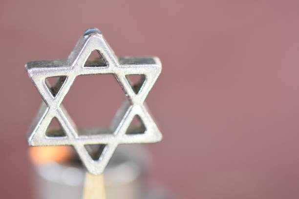 istock Star of David on a candle background 1089442958