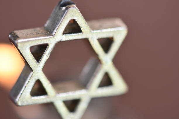 istock Star of David on a candle background 1089443282